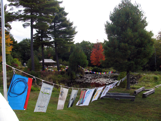 Photo of artists’ flags made for Thomas Matsuda’s project Prayer Flags around the World